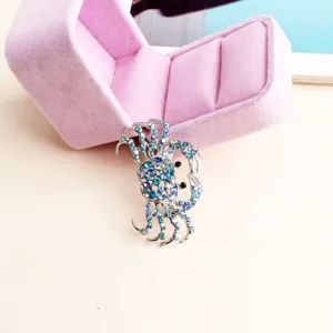 Alloy blue rhinestone crystal crab brooch pin, sparkling animal clothing fashion accessory.