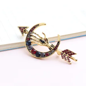 Vintage gold hand eye arrow crescent moon brooch with colorful rhinestones for women suits.