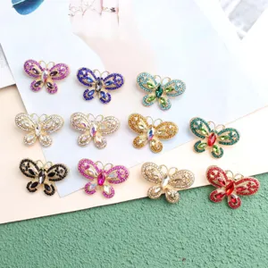 Colorful butterfly rhinestone charms sparkle brightly, ideal for stunning nail art and DIY jewelry.