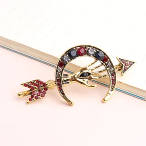 Vintage rhinestone crescent moon and hand eye brooch, retro alloy decorative pin for suit.