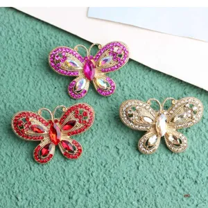 Detailed close-up shot of sparkling crystal butterfly nail art charms with alloy rhinestones.