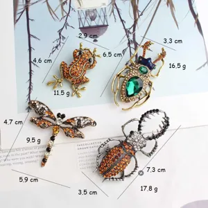 Stralende insecten broche set met kikker en libel ontwerpen voor dameskleding accessoires.