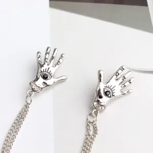 Punk gothic silver hand brooch with chain tassel and crystal eye detail fashion metal jewelry