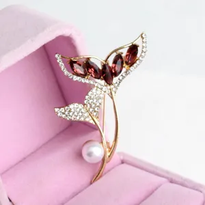 Elegant fish tail pearl brooch with red crystals, exquisite shiny rhinestone pin for women.