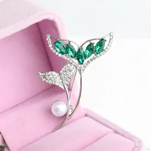 Elegant green rhinestone and pearl fish tail brooch, sparkling crystal lapel pin for women.