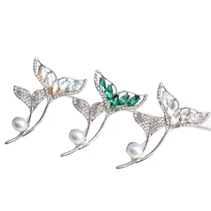 Exquisite mermaid tail rhinestone pearl brooch pin set, elegant fashion clothing accessory.