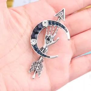 Vintage crescent moon arrow hand brooch, blue rhinestone gothic pin for suit accessories