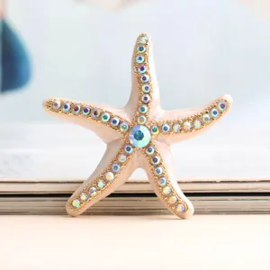 Exquisite starfish rhinestone brooch, beach vacation style marine accessory for women.