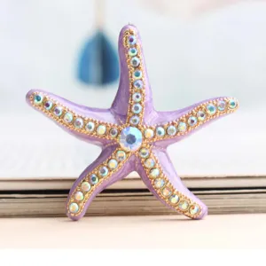 Purple rhinestone starfish accessory detail close-up ocean beach style jewelry element