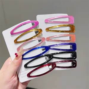 Colorful hollow oval hair clips set, glossy snap hairpins for women and girls daily styling.