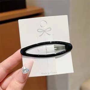 Minimalist black hollow oval hair clip elegant geometric side hairpin for women daily hair styling