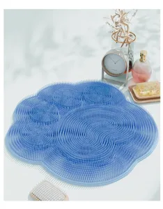 Silicone foot scrubber mat for bathroom shower, anti-slip massage pad with soft bristles.