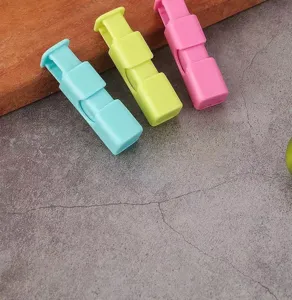 Plastic snack bag sealing clips set, colorful food preservation clips for kitchen use.