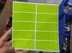 Reflective stickers sheet showing high visibility honeycomb pattern for vehicles safety.