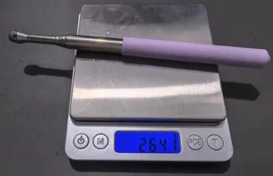 Retractable touchscreen teaching pointer with purple sponge grip for classroom use.