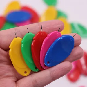 Colorful plastic needle threader set designed for easy hand sewing and quick threading.