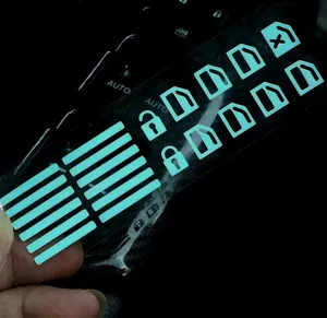 Luminous car window switch sticker, glow in dark button decals for interior modification.