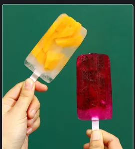 Detail view of homemade fruit popsicles showing mold usage effect, fresh and delicious dessert.