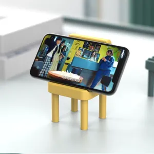 Cute mini stool phone stand desktop lazy support rack detail view for hands free video watching.