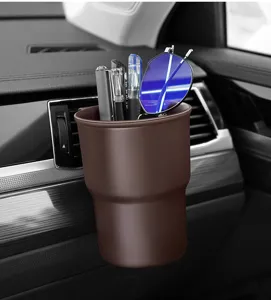 Versatile car cup holder in brown color, portable hanging design for air vent storage use.
