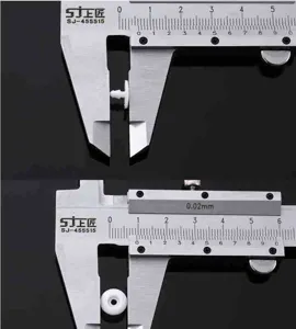 Plastic snap fastener for face mask and wristband, durable white plastic buckle detail shot.