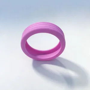 Silicone luggage wheel protector detail view, purple caster cover, anti-wear silent design.