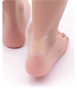 Transparent hydrogel heel sticker close up detail, soft anti-friction foot care pad.