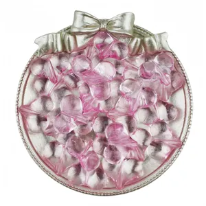 Clear acrylic pink heart beads for DIY jewelry making and handmade bracelets detail shot.