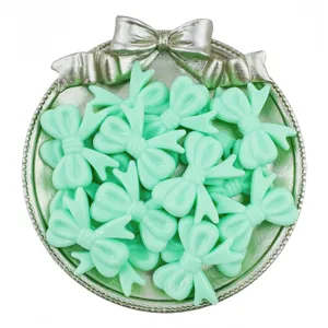 Mint green acrylic bow beads bulk DIY jewelry making accessories charm pendant bracelet crafts.