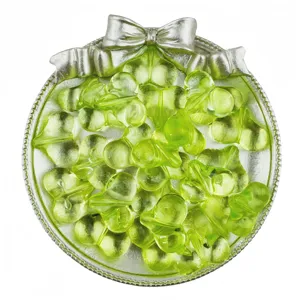 Detailed view of translucent light green heart acrylic beads for DIY handmade jewelry accessories.