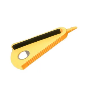 Multifunctional yellow jar opener detail view, non-slip ergonomic kitchen tool design.