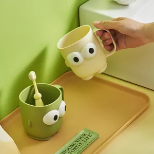 Cute big eye plastic mouthwash cup with handle for kids boys and girls, creative toothbrush cup.