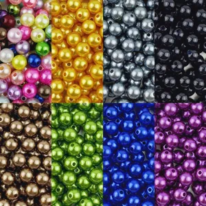 Detail view of colorful ABS imitation pearl beads, round loose beads for DIY jewelry making.