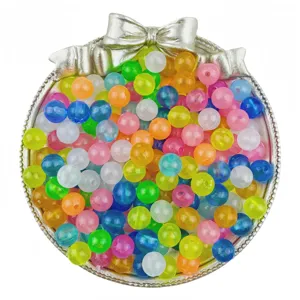 Detail view of colorful acrylic jelly round beads, DIY handmade jewelry accessories making.