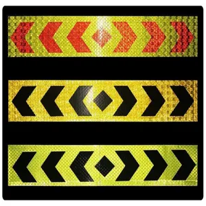 Detailed view of reflective safety tape with bidirectional arrow pattern, night warning reflective film.