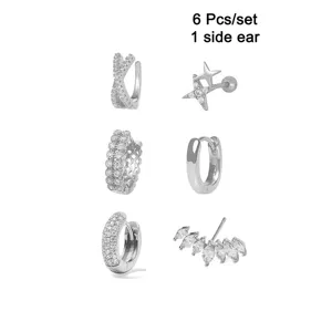 Set of 6 silver rhinestone ear cuffs and stud earrings for stylish minimalist looks.
