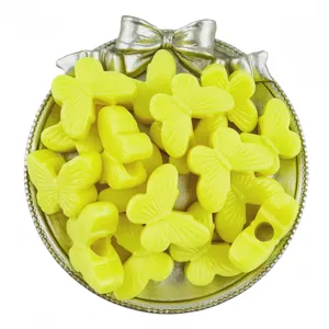 Yellow acrylic butterfly beads detail shot, large hole spacer charms for diy jewelry making.