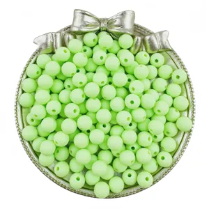 Matte green acrylic round beads in silver bow tray, perfect for DIY handmade jewelry crafts detail