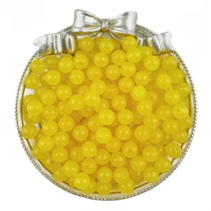 Yellow acrylic round jelly beads detail shot, perfect for DIY bracelets and jewelry making.