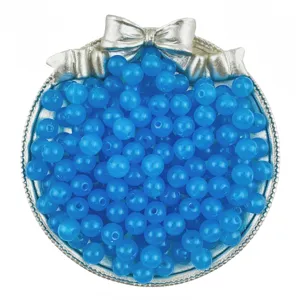 Detailed view of blue jelly acrylic round beads in container, ideal for DIY bracelet making.