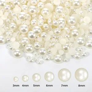 Détail en gros plan de perles d'imitation ABS plates, échelle de taille de 3mm à 8mm pour bricolage.