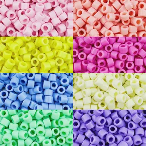 Detailed view of colorful 6x5mm acrylic barrel pony beads for DIY crafts and jewelry.