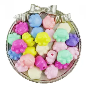 Detail view of colorful acrylic cat paw beads with horizontal holes, perfect for DIY jewelry making.