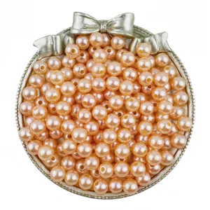 Peach pink ABS imitation pearl beads with straight holes for DIY handmade jewelry bracelets.