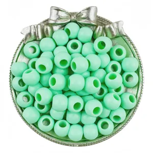 Mint green acrylic large hole round beads detail shot for DIY jewelry making and bracelets.