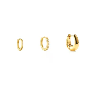 Gold plated huggie hoop earrings set featuring smooth, paved stone and chunky dome designs.