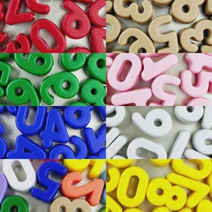 Acrylic number beads detail close-up, colorful DIY handmade jewelry accessories charms material.