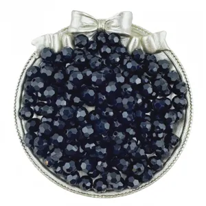 Detailed close-up shot of sparkling black faceted acrylic craft beads for DIY jewelry making.