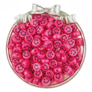 Pink acrylic smiley face beads detail closeup, 6x10mm loose beads for DIY handmade jewelry.