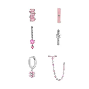 Primer plano detallado del conjunto de pendientes de circonita rosa y esmalte para estilo.
